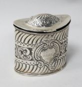 A late Victorian repousse silver oval tea caddy, Birmingham, 1897, height 82mm, 3.9 oz.