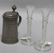 A mid 18th century German pewter flagon and a pair of liqueur glasses