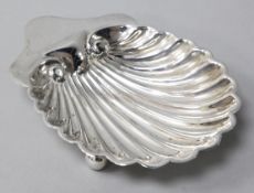 A George V silver butter shell, London, 1921, 13cm.