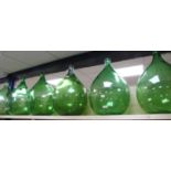 Six green glass carboids and two clear glass ditto tallest 63cm