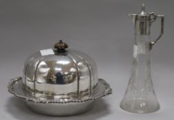 A silver plated muffin dish and cover and a WMF plate mounted liqueur jug