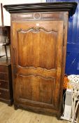 A 19th century French chestnut armoire, W.119cm