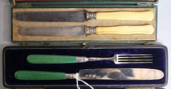 A George III silver and stained ivory handled knife and fork, Sheffield, 1792, in later case and two