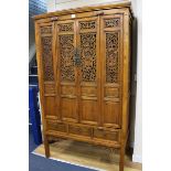 A Chinese yellow wood cabinet, 19th century W.117cm