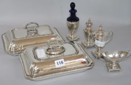 Two plated entree dishes and a condiment set