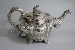A Victorian silver teapot by Reily & Storer, of inverted pear form, with foliate decoration, and