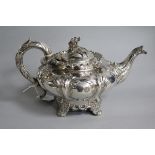 A Victorian silver teapot by Reily & Storer, of inverted pear form, with foliate decoration, and