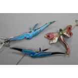 A Charles Horner silver and enamel bird brooch and two other enamelled brooches, 8cm.