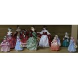 Twelve Royal Doulton figurines and two other pottery figural groups