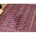 A Persian blue medallion rug 183 131cm