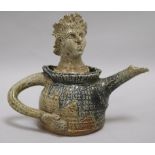 A novelty salt glaze stoneware teapot