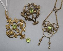 Three early 20th century 9ct gold , peridot and seed pearl pendants, including one with 9ct gold