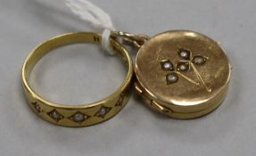 An 18ct gold seed pearl ring and a yellow metal and seed pearl locket.