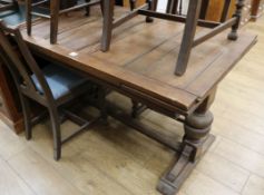 An oak refectory table and four chairs W.124cm unextended