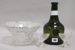 A cut glass bowl, two salts and a wine bottle, bottle height 23cm