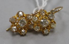A pair of yellow metal and old cut diamond cluster earrings.