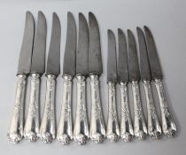 A set of six 19th century French silver handled table knives and five dessert knives.