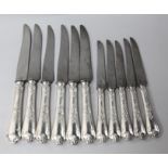 A set of six 19th century French silver handled table knives and five dessert knives.