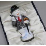 Nine Halcyon Days Enamels bonbonnieres modelled as snowmen, all boxed.