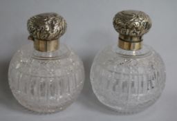 A pair of late Victorian silver mounted cut glass globular scent bottles, Haseler Brothers,