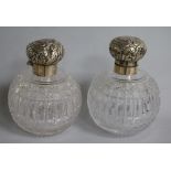 A pair of late Victorian silver mounted cut glass globular scent bottles, Haseler Brothers,