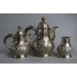 A 20th century Indonesian white metal three piece coffee set.