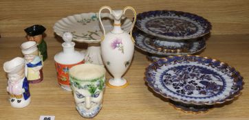 A Bacchus jug, a part dessert set, Toby jugs etc