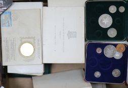 A collection of cased Franklin coin sets