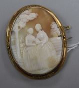 A 9ct gold mounted oval cameo brooch, 56mm.