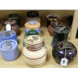 A Royal Doulton Slaters Patent tobacco jar and 11 other tobacco jars, various