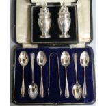 A cased set of six silver teaspoons and tongs, Sheffield, 1921 and a cased pair of silver