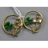 A pair of yellow metal, enamel and seed pear set shamrock and thistle openwork circular brooches,