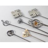 Seven assorted Charles Horner hatpins including one 9ct gold.The property of :Mrs BA Hamilton-