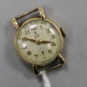 A lady's 1950's? 9ct gold Tudor manual wind wrist watch, (no strap).