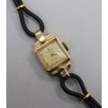A lady's 9ct gold Rolex precision manual wind wrist watch.