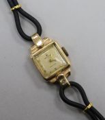 A lady's 9ct gold Rolex precision manual wind wrist watch.