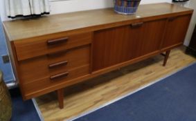 A Scandinavian teak sideboard W.224cm