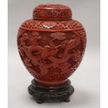 A Chinese cinnabar lacquer jar and cover