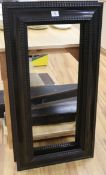 A pair of ebonised picture frames