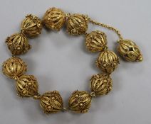 A silver gilt filligree sphere bracelet.