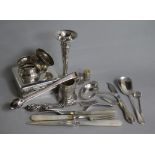 Assorted silver and other items including a silver cigarette box, silver spoons and napkin rings.