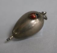 A late 19th/early 20th century 800 standard silver novelty ovoid propelling pencil with enamelled