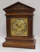 A W & H oak mantel clock, ting tang striking, height 41cm