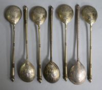 A set of six early 20th century Russian 84 zolotnik silver gilt tea spoons and one other Russian