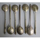 A set of six early 20th century Russian 84 zolotnik silver gilt tea spoons and one other Russian