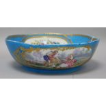 A Sevres bleu celeste salad bowl, later painted to the interior with a portrait of Louis XVI