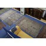 Five Persian rugs