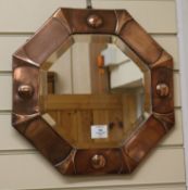 A copper frame octagonal mirror, W.43cm