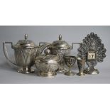 A 20th century Indonesian white metal hot milk jug and lidded sugar bowl and three other items.