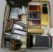 A collection of Dupont 'laque de chine' and other cigarette lighters